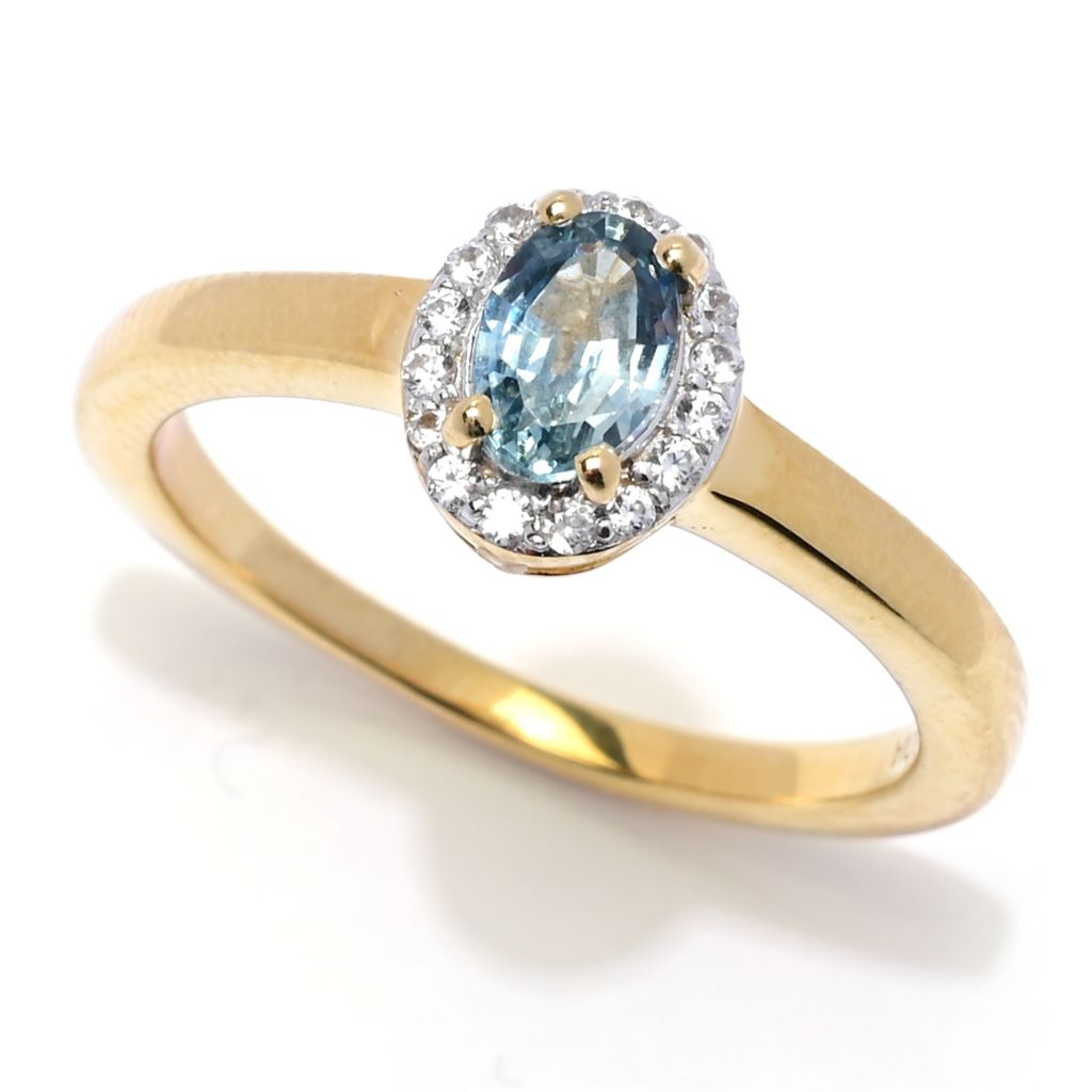 Gem Treasures 0.66ctw Oval Montana Sapphire & White Zircon Halo Ring