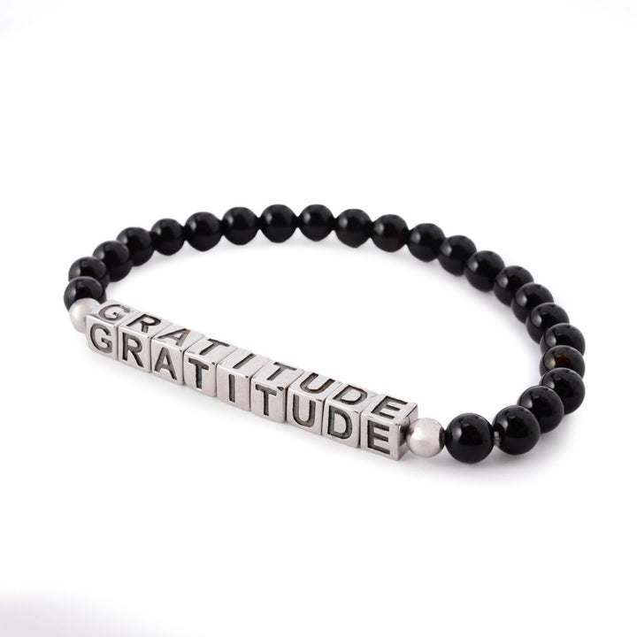 MUSE Platinum Plated Choice of Mantra Black Onyx Bead Stretch Bracelet